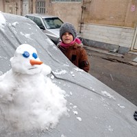 شادی مردم قم از بارش برف+ عکس/فیلم