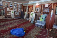 گزارش تصویری | نمایشگاه "ردای سرخ" کنگره ۴۰۰۰ شهید روحانی در قم