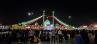 پرچم ۳ رنگ ایران بر گنبد فیروزه‌ای مسجد جمکران 